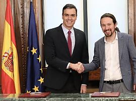 Sánchez e Iglesias rubrican el acuerdo para un Gobierno de coalición progresista