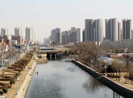 China estudia construir casas que ahorren energía para lograr ciudades con bajas emisiones de carbono