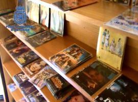 La Policía Nacional desmantela un centro de grabación de CD y DVD falsos