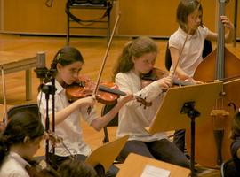 Acto de la escuela de música de Oviedo en beneficio cocina económica
