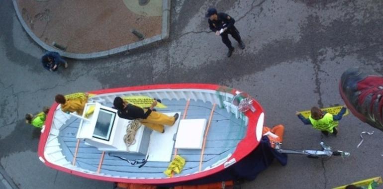  Greenpeace encadena un barco al Ministerio 