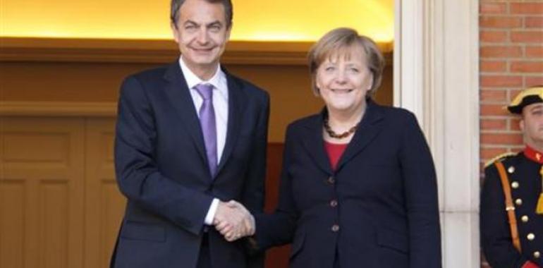 Merkel, Sarkozy y Zapatero analizan conjuntamente los ataques al euro hoy viernes